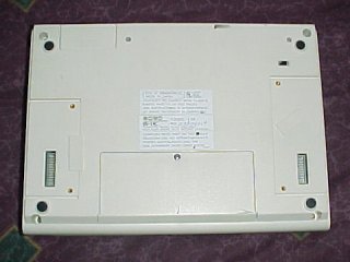 A look at the bottom of the IS-11C.  Note the backup switch, printer interface, and external keyboard connector.